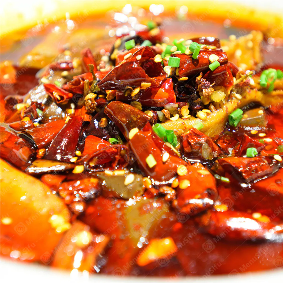 Sichuan spicy boiled fish covered in dried chili, peppercorn and chopped green onion at Sichuan Wok, a Chinese Restaurant in Troy